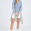 WASHED V NECK EXPOSED SEAM LONG SLEEVE KNIT TOP